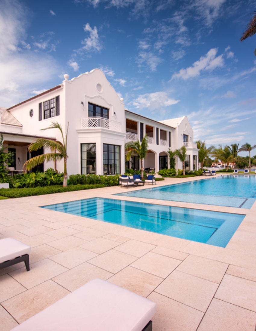 Luxurious mansion with a pristine pool, offering an upscale living experience and breathtaking views